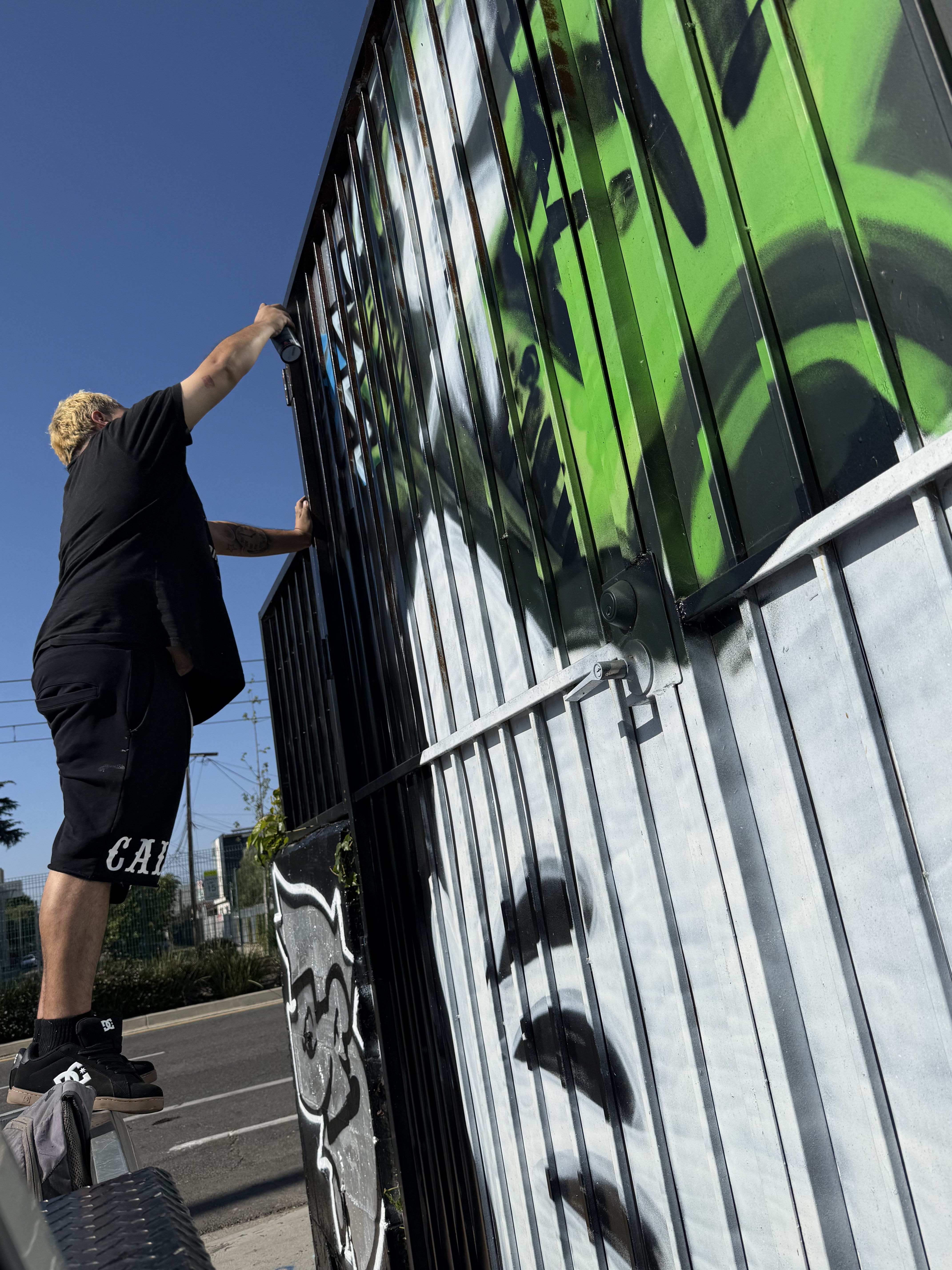 4MAT painting a container in Los Angeles